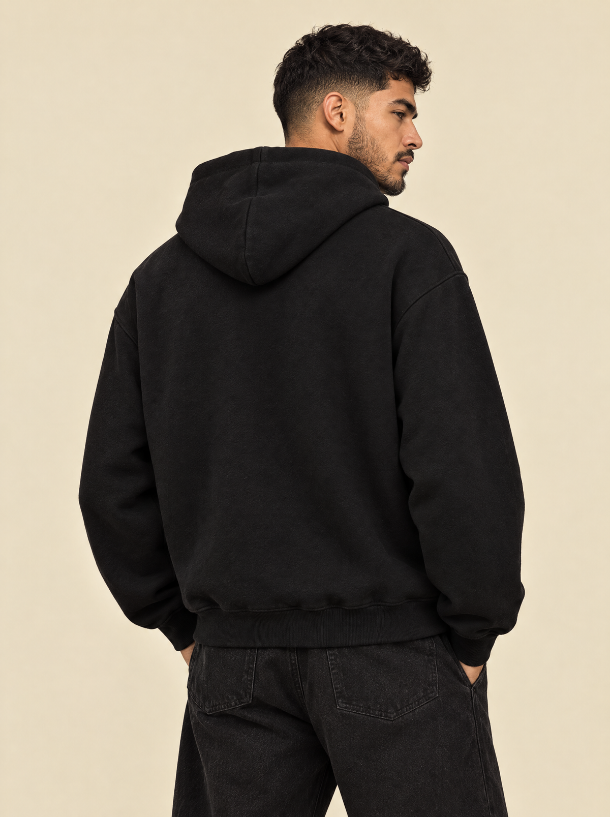 Black — Back view, boxy drop-shoulder fit with hood