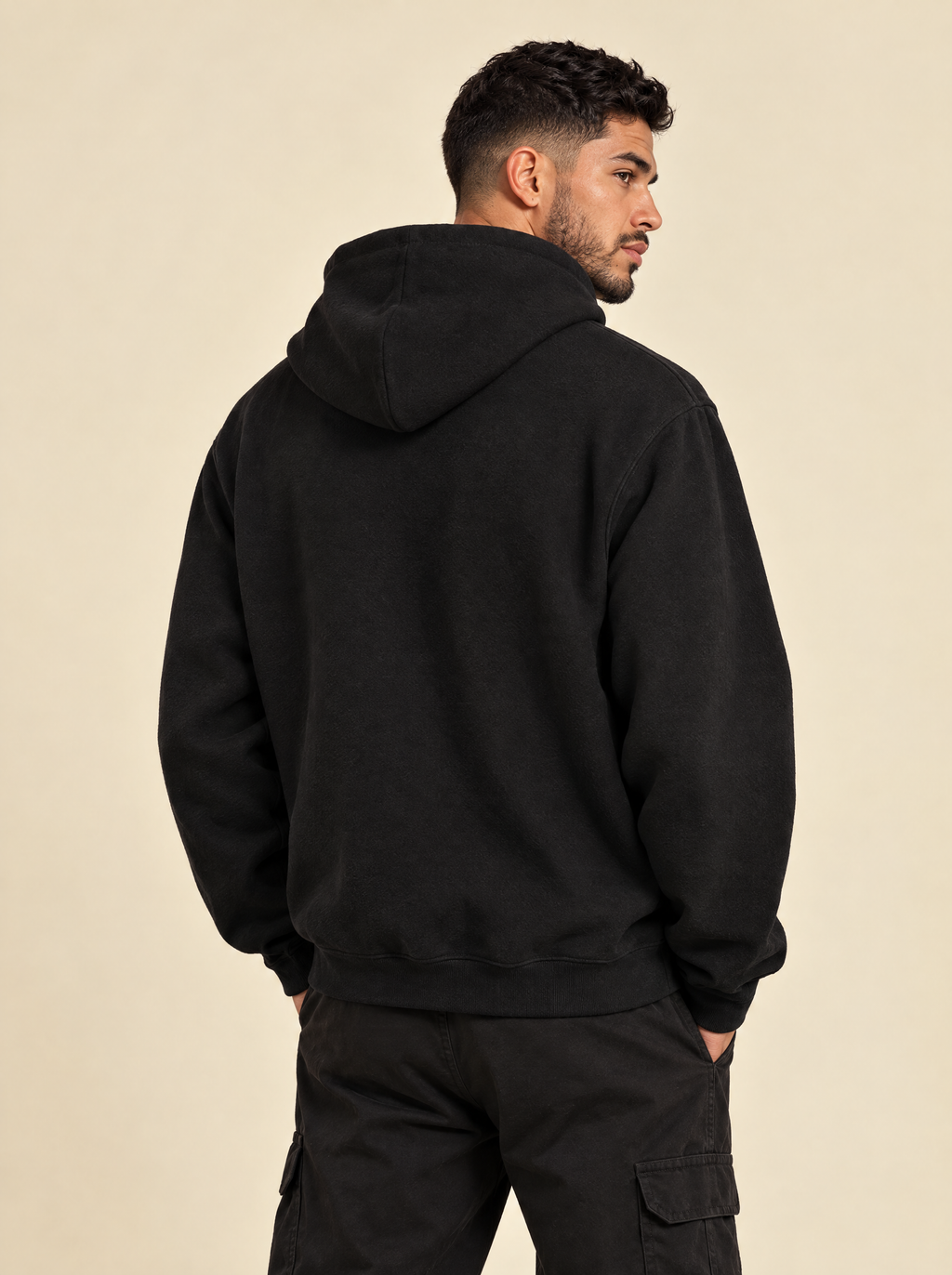 Black — Back view, boxy drop-shoulder fit with hood